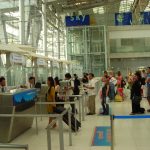 Passengers queuing at airport passport control